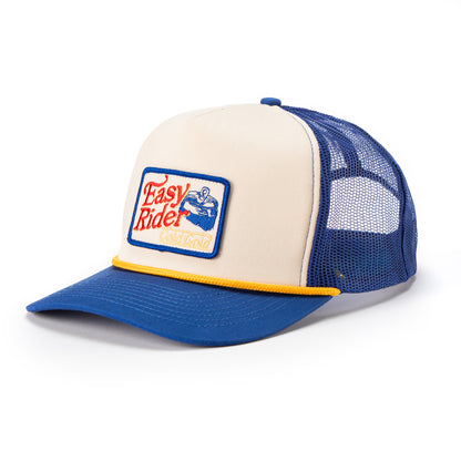 Side view of blue trucker style hat with white front panel and gold rope. Sewn in pactch with words that read easy rider cold gold and image of open can.